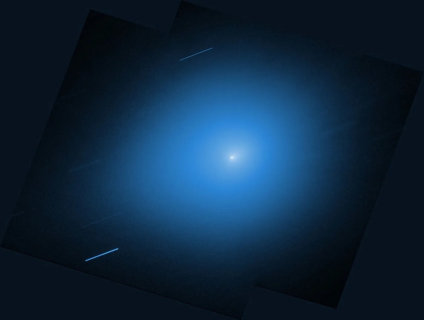 Hubble Space Telescope image of interstellar comet 3I/ATLAS, a bright point with a faint tail