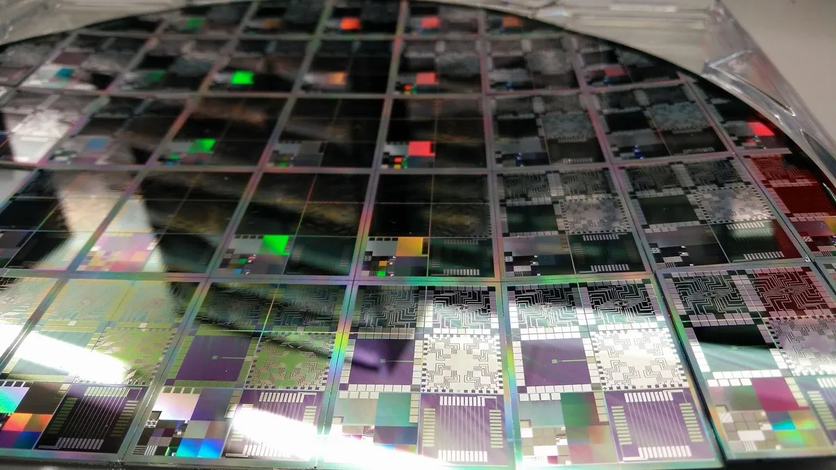 Semiconductor wafer with dozens of chips patterned on its surface