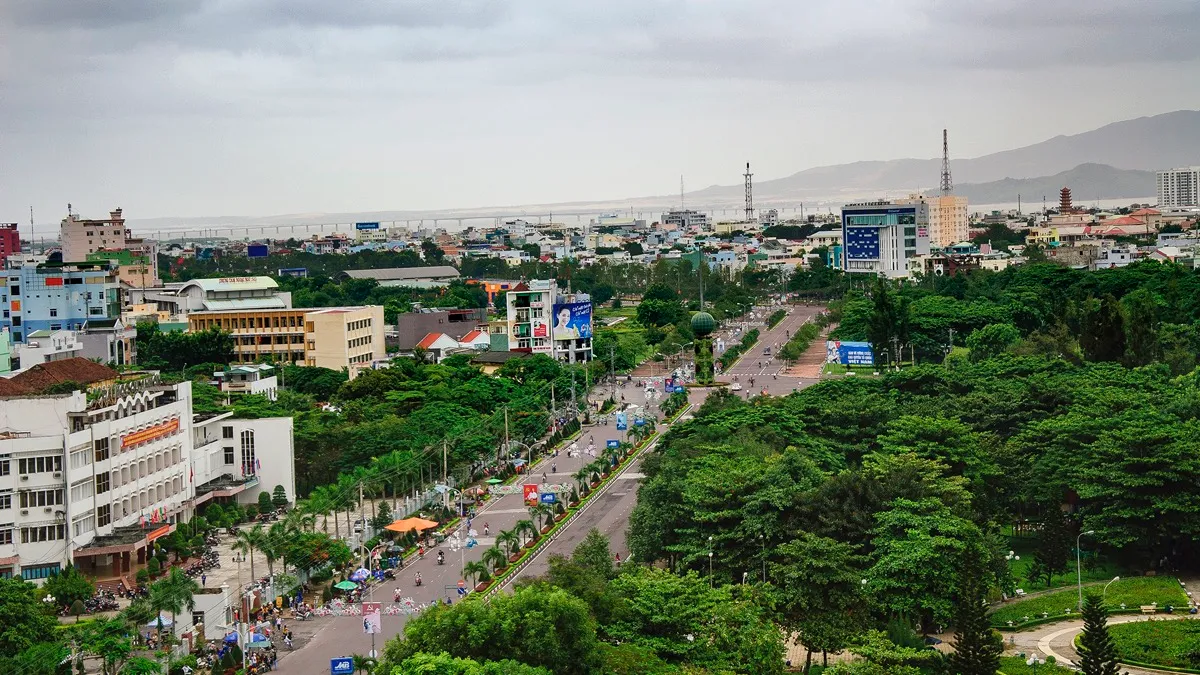 View of the coastal city of Quy Nhơn, Vietnam, with buildings facing the sea
