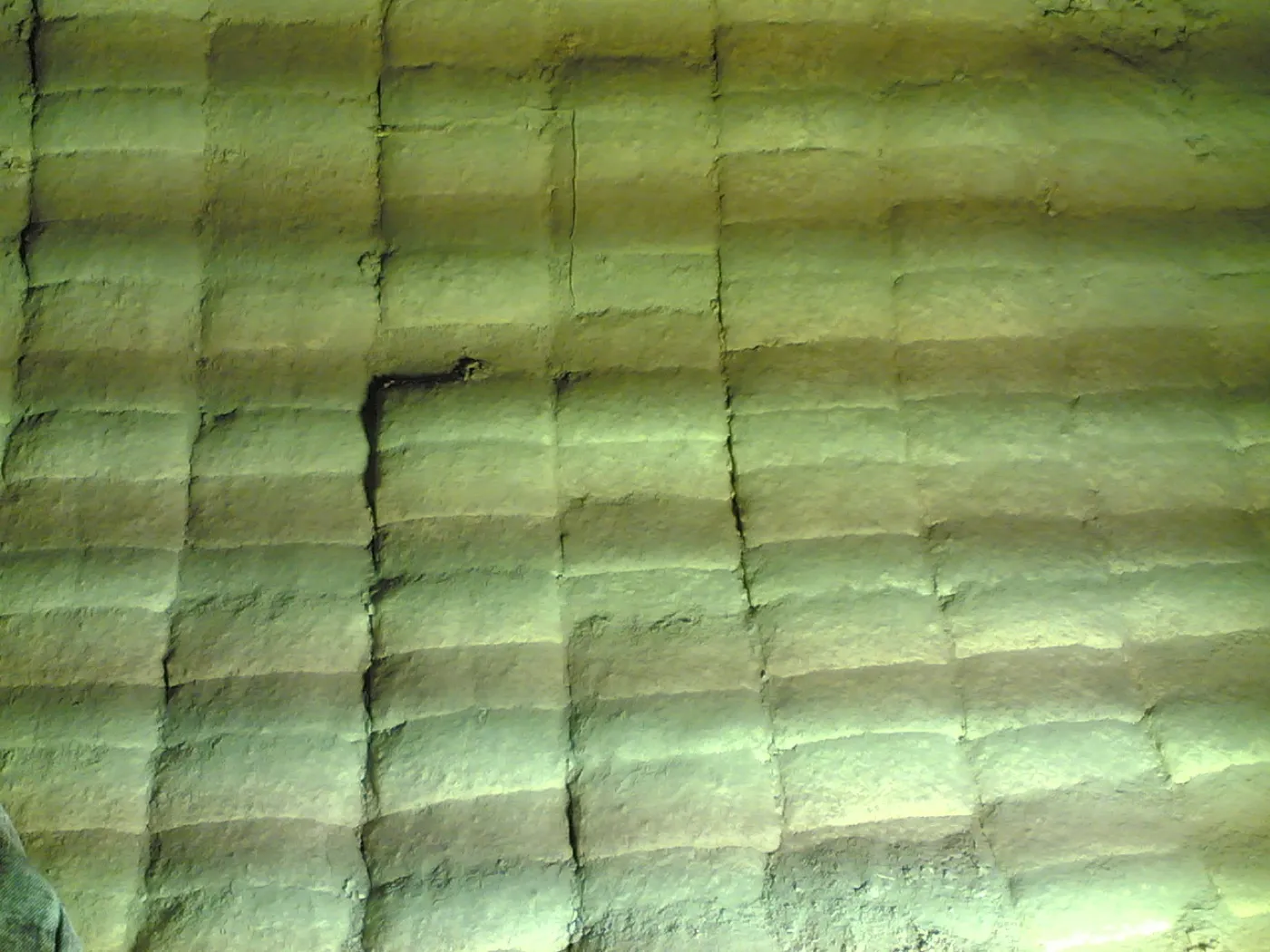 Refractory brick lining inside an industrial furnace